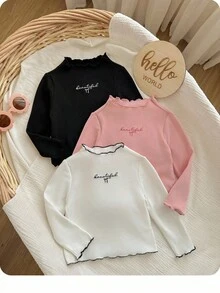 SHEIN Top à manches longues pour bébé fille, style décontracté et mignon, en tricot de couleur unie avec broderie graphique de lettre