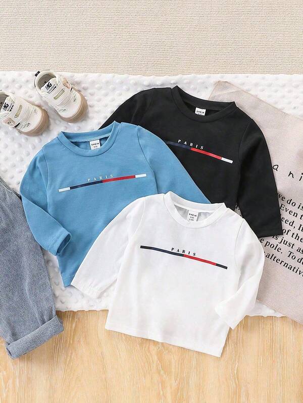 SHEIN Playful Pals 3 sztuki bluzek dla chłopców z okrągłym dekoltem i długim rękawem, z nadrukiem w litery, w kolorze niebieskim, czarnym i białym, z modnym wzorem graficznym, dopasowanym krojem, w swobodnym stylu, miękka i wygodna tkanina, odpowiednia na wakacje, podróże, do szkoły, na codzienne spotkania, do sportu, na wiosnę/lato