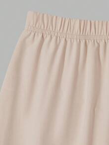 Elladie kids بدلة كاجوال للمراهقات تتكون من قميص أكمام قصيرة منتفخة ذو رقبة على شكل حرف V أحادي الصدر وبنطال، بلون واحد - لون مشمشي - مشاهدة 8