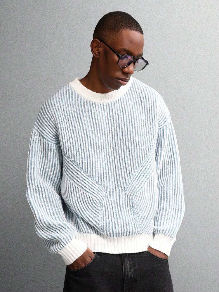 Pull ras du cou en maille côtelée technique