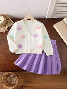 Sparklyn 女童毛衣套装：米色圆领长袖针织开衫，搭配紫色针织迷你裙。优雅时尚的两件套，适合日常穿着、休闲、上学、旅行，秋冬季皆宜。女童毛衣套装两件套，女童百褶裙套装，女童针织套装，女童毛衣裙套装（秋季款）。 - 彩色 - 查看 3