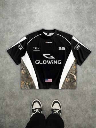 Manfinity Roghcode Camiseta holgada de estilo callejero de talla grande para hombres con parches, camuflaje y contraste de colores