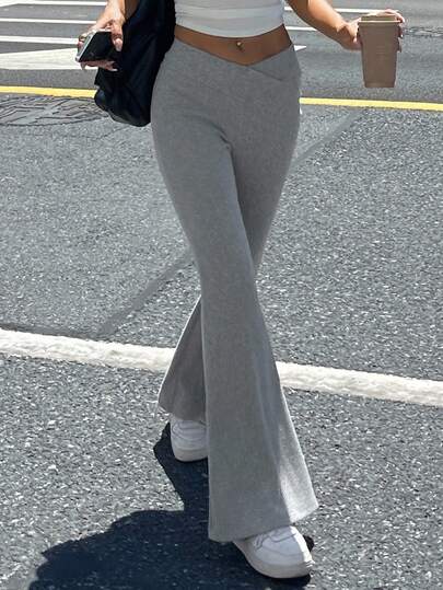 DAZY 女式交叉腰合身喇叭瑜伽裤