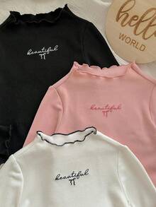 SHEIN Top à manches longues pour bébé fille, style décontracté et mignon, en tricot de couleur unie avec broderie graphique de lettre