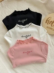 SHEIN Top à manches longues pour bébé fille, style décontracté et mignon, en tricot de couleur unie avec broderie graphique de lettre
