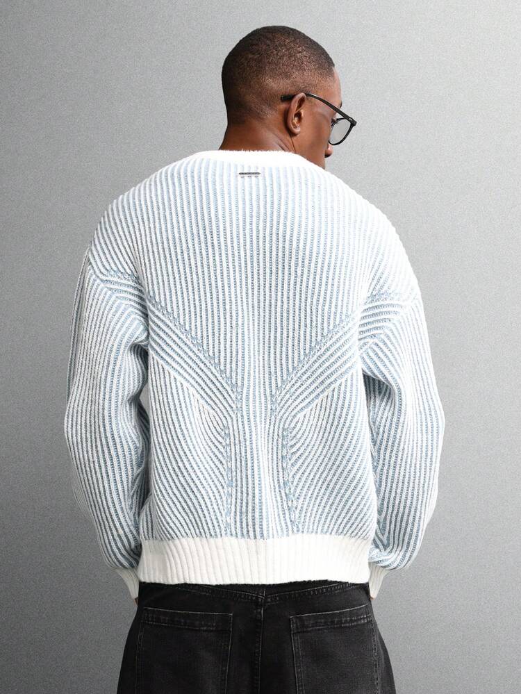 Pull ras du cou en maille côtelée technique