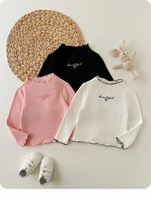 SHEIN Top à manches longues pour bébé fille, style décontracté et mignon, en tricot de couleur unie avec broderie graphique de lettre