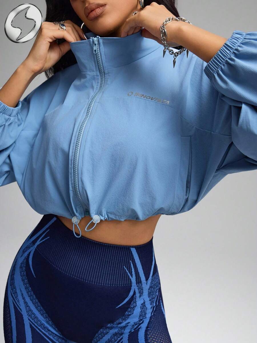 Innovista 轻便拉链运动夹克，宽松版型，适合热身、短款健身上衣、宽松版型、带口袋、防紫外线、防风、蓝色、举重、力量训练套装、哑铃、户外、骑行、跑步、有氧运动、瑜伽和普拉提、拳击、徒步旅行、网球和高尔夫、运动装备、健身服和运动套装、都市休闲运动、时尚偶像、时尚达人、闪耀动人、适合音乐节和派对、街头性感、日常必备、TikTok运动服、激励秋季女装，清爽浅蓝色 - 淺藍色 - 查看 1