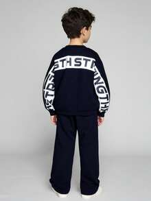 JNSQ Set de 2 piese pentru băieți, bluză cu guler rotund și mânecă lungă, cu imprimeu cu litere în blocuri de culori pe spate, asortată cu pantaloni lungi de trening, potrivită pentru toamnă, iarnă, purtare zilnică, activități în aer liber, vacanță, streetwear, petrecere, casual