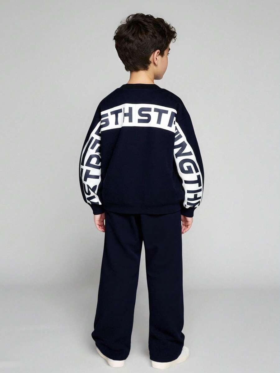 JNSQ Set de 2 piese pentru băieți, bluză cu guler rotund și mânecă lungă, cu imprimeu cu litere în blocuri de culori pe spate, asortată cu pantaloni lungi de trening, potrivită pentru toamnă, iarnă, purtare zilnică, activități în aer liber, vacanță, streetwear, petrecere, casual