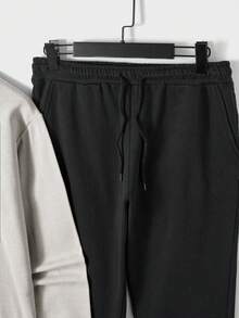 Felpa in cotone da uomo con grafica a lettere e pantaloni della tuta con vita con coulisse