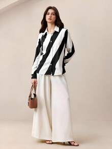 BizChic Camisa de mujer a rayas negras y blancas con botones delanteros, elegante, romántica y versátil, adecuada para invitados de boda, fiestas, conciertos, brunch, aeropuerto y moda diaria, también apta para Halloween y Navidad