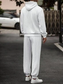 Manfinity Homme Set di felpa con cappuccio e pantaloni della tuta in colore unito con texture, abbigliamento autunnale, completi comodi