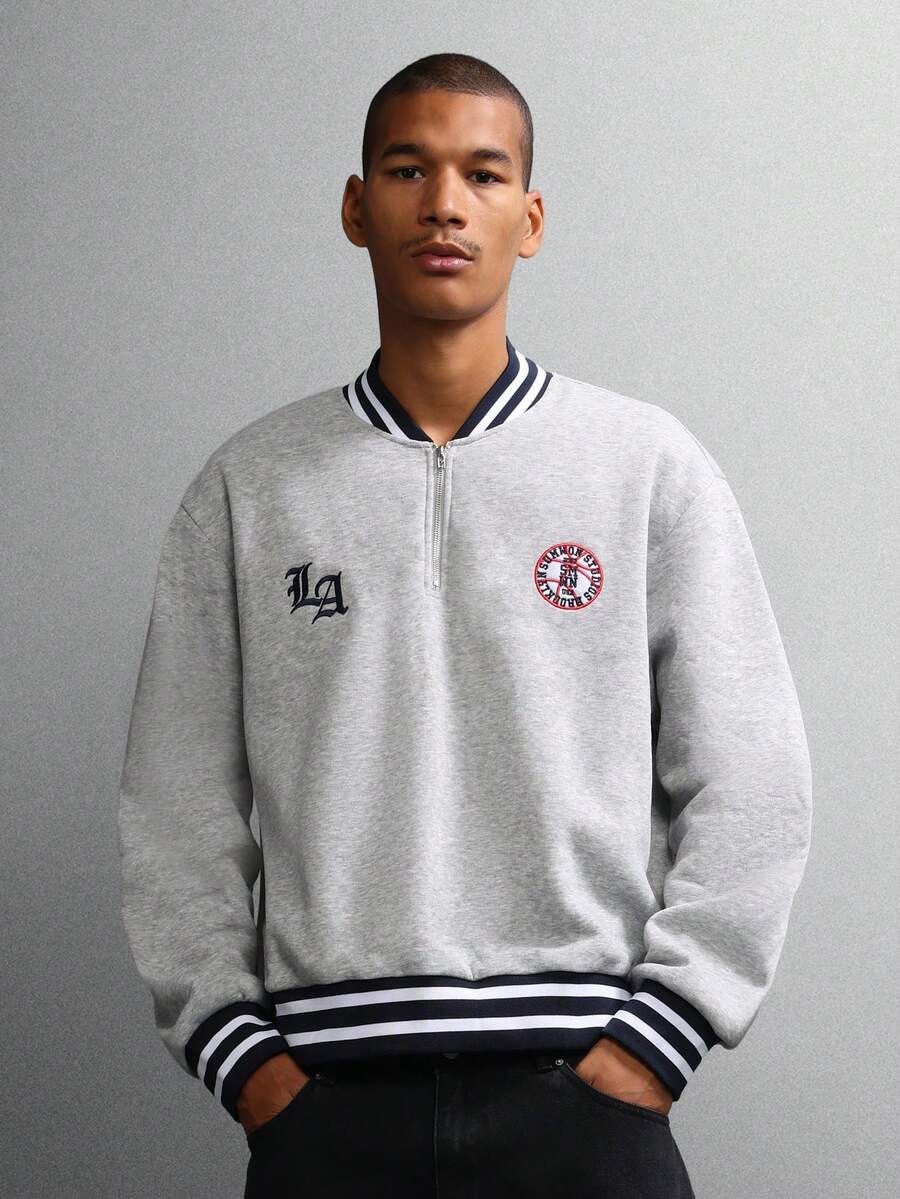 SUMWON Sudadera con media cremallera, ajuste corto, con detalles de ribete de estilo universitario, logo, cuello y puños acanalados. Ropa de estar en casa casual para otoño e invierno, diseño clásico de moda urbana - Gris Claro - Ver 1
