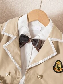 Souflis Souflis 年轻女孩经典学院风徽章领撞色饰边西装外套，搭配格纹蝴蝶结格子百褶裙套装。适合秋冬季节校园穿着，展现俏皮绅士风范 - 卡其色 - 查看 4