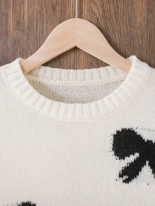 SHEIN Vestido suéter feminino 1 peça, estilo fofo, estampa jacquard com laço preto, gola redonda, manga regular, punho e bainha franzidos, espessura regular, vestido de malha elegante na cor marfim, caimento elegante e elegante, adequado para primavera, outono e inverno