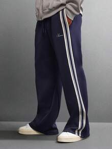 SUMWON 喇叭形慢跑裤，侧边饰带细节，优质冬季休闲服，舒适阔腿街头风长裤，饰有品牌标志设计，纯色 - 寶藍色 - 查看 1