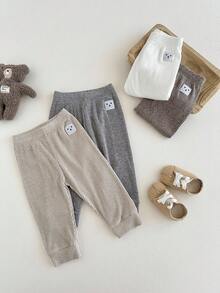 SHEIN 4 件套男婴/中性笑脸设计裤子，舒适可爱，适合户外玩耍或日常穿着，四季皆宜