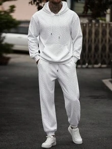 Manfinity Homme Set di felpa con cappuccio e pantaloni della tuta in colore unito con texture, abbigliamento autunnale, completi comodi