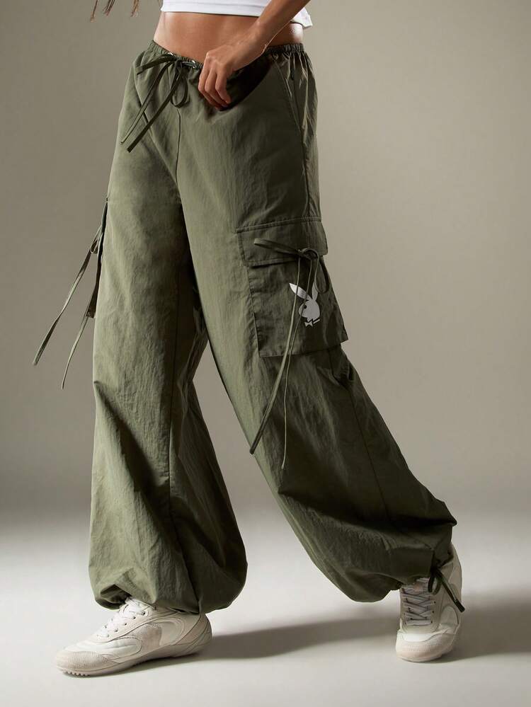 Missguided x Playboy Oversized Cargo Parachute Pants With Multiple Pockets And Drawstring Details For Casual Street Style