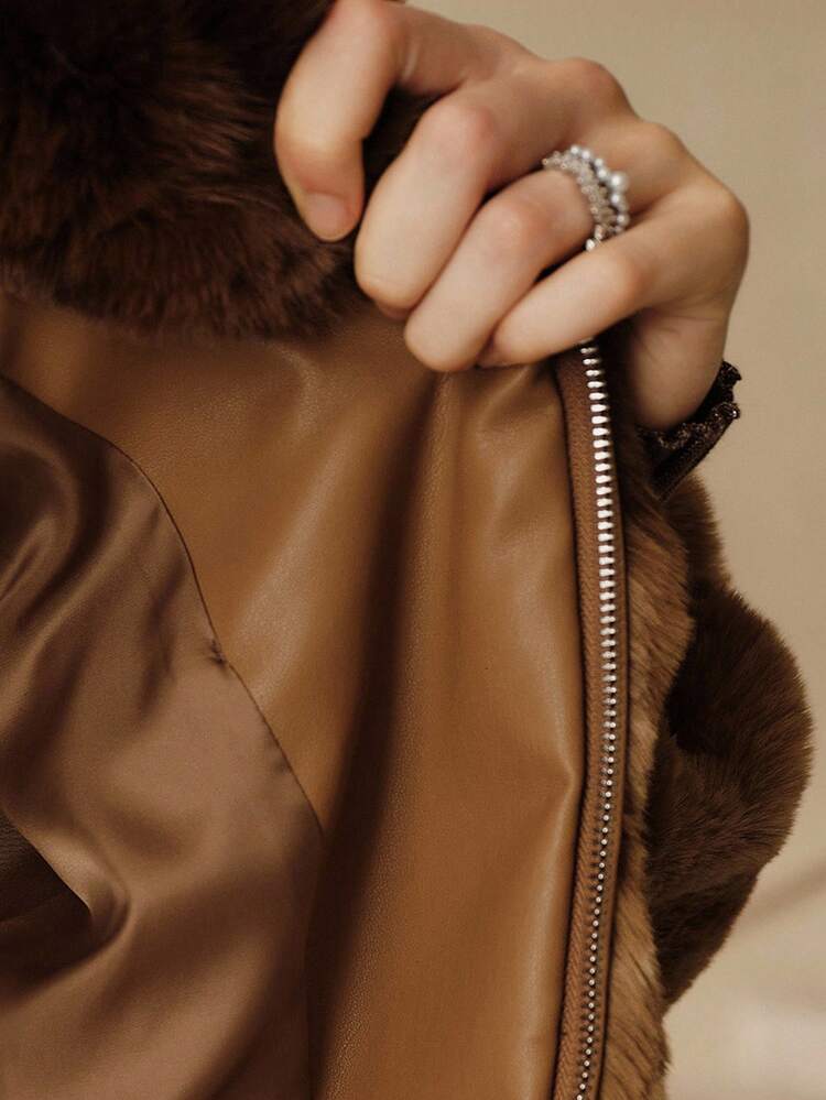 Chaqueta con capucha con cremallera de piel sintética de moda para mujer