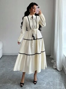 Rafferiza 女式优雅波浪纹拼布流苏领带 V 领灯笼袖喇叭裙 - 杏色 - 查看 1