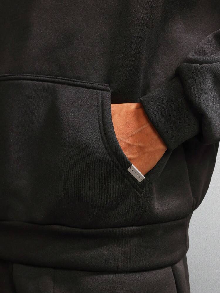 Pull à capuche avec cordon de serrage et pantalon de jogging assorti