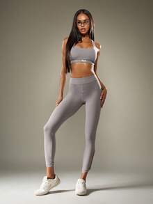 Missguided x Playboy Áo ngực thể thao lưng chéo hỗ trợ trung bình thấm hút mồ hôi tập luyện thể thao chạy bộ yoga kiểu dáng áo ba lỗ tập luyện hiệu suất tập luyện thể dục bó sát tập luyện tại phòng tập thể dục - Màu xám đen - Xem 4