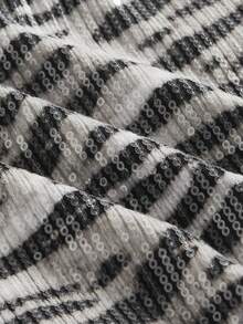 Y2Kool Minifalda de mujer con estampado animal, lentejuelas y color metálico, adecuada para fiestas de Halloween y vacaciones. Falda de lentejuelas con estampado de cebra, idea de combinación casual. Falda con estampado animal para mujer, falda gráfica, falda blanca y negra, falda de cebra para mujer, colección de ropa de estilo, nuevos atuendos de Año Nuevo