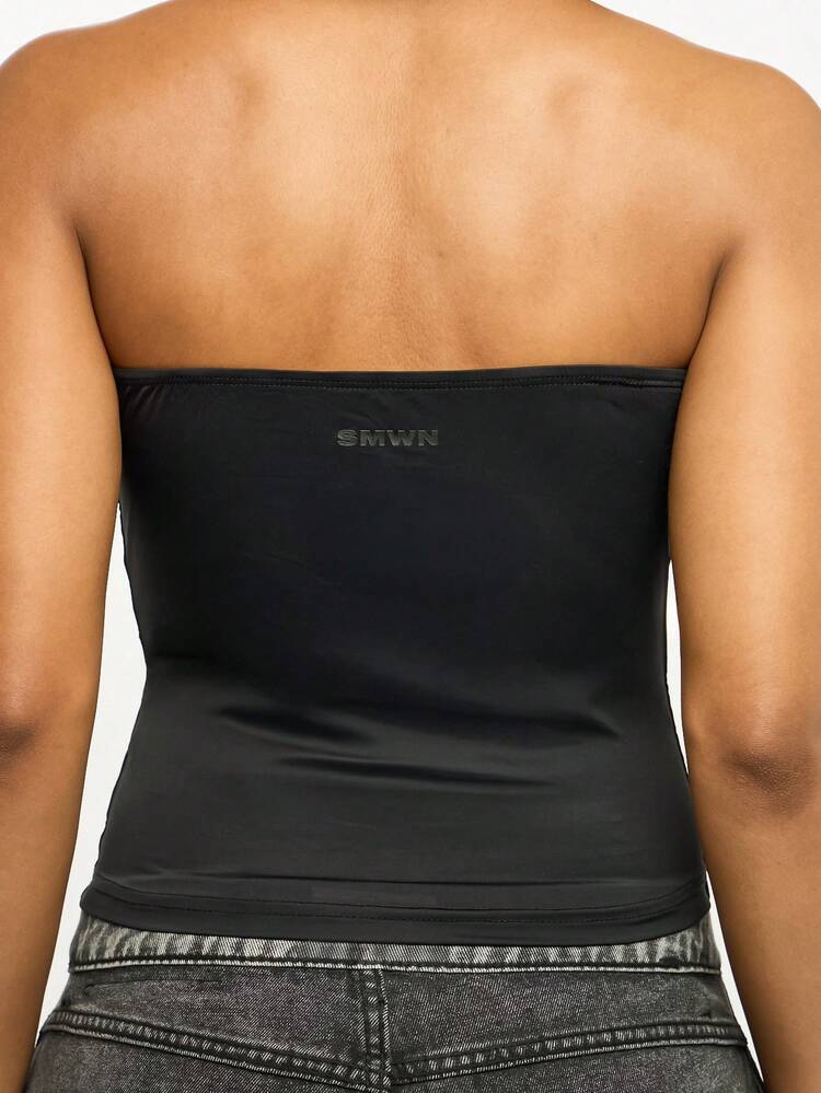 SUMWON WOMEN Top corto ajustado con cuello halter y canalé