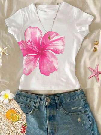 SHEIN T-shirt à manches longues col rond minimaliste confortable pour fille préado, coupe slim, imprimé floral tropical bleu avec hibiscus, frangipanier et motif bord de mer. Convient pour l'été, les tenues d'été, le confort facile, les couches d'automne pour les enfants, les enfants stylés, les vêtements casual, les vêtements graphiques pour enfants, la rentrée scolaire, les vêtements d'automne, l'homecoming.