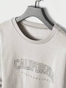 Felpa in cotone da uomo con grafica a lettere e pantaloni della tuta con vita con coulisse