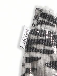 Y2Kool Minifalda de mujer con estampado animal, lentejuelas y color metálico, adecuada para fiestas de Halloween y vacaciones. Falda de lentejuelas con estampado de cebra, idea de combinación casual. Falda con estampado animal para mujer, falda gráfica, falda blanca y negra, falda de cebra para mujer, colección de ropa de estilo, nuevos atuendos de Año Nuevo