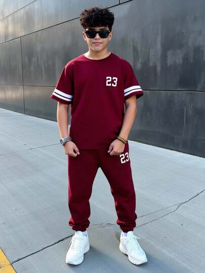 SHEIN Conjunto de 2 peças de roupa infantil para meninos pré-adolescentes, casual, com listras misturadas, estampa, gola redonda, pulôver, manga curta, camiseta e calça canelada na cintura, malha, 2 peças