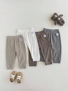 SHEIN 4 件套男婴/中性笑脸设计裤子，舒适可爱，适合户外玩耍或日常穿着，四季皆宜