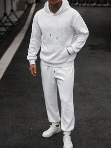 Manfinity Homme Set di felpa con cappuccio e pantaloni della tuta in colore unito con texture, abbigliamento autunnale, completi comodi