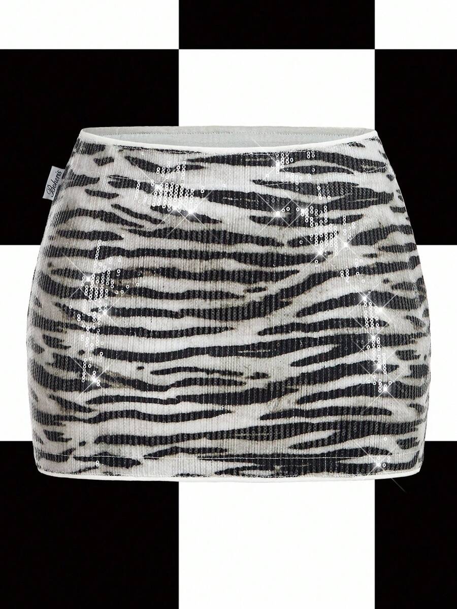 Y2Kool Minifalda de mujer con estampado animal, lentejuelas y color metálico, adecuada para fiestas de Halloween y vacaciones. Falda de lentejuelas con estampado de cebra, idea de combinación casual. Falda con estampado animal para mujer, falda gráfica, falda blanca y negra, falda de cebra para mujer, colección de ropa de estilo, nuevos atuendos de Año Nuevo
