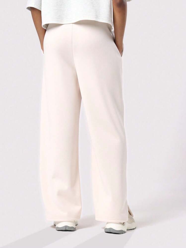 Flared Leg Sweatpants With Side Split Detail
