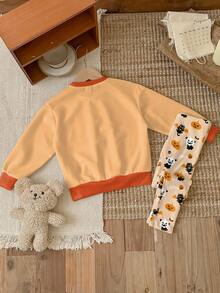 SHEIN Conjunto de sudadera y leggings con estampados de Halloween de 2 piezas para niñas, con diseños lindos de fantasma, calavera, araña, calabaza y murciélago, adecuado para otoño/invierno, disfraz de Halloween