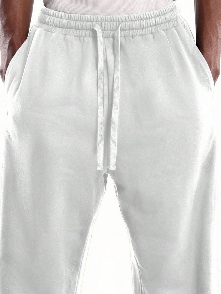 Pantaloni della tuta a gamba larga con coulisse in vita e tasche
