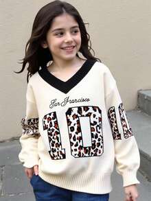SHEIN Suéter holgado de manga larga, cuello en V, estilo callejero informal para niña preadolescente, con estampado de leopardo y logo de LA - Albaricoque - Ver 6