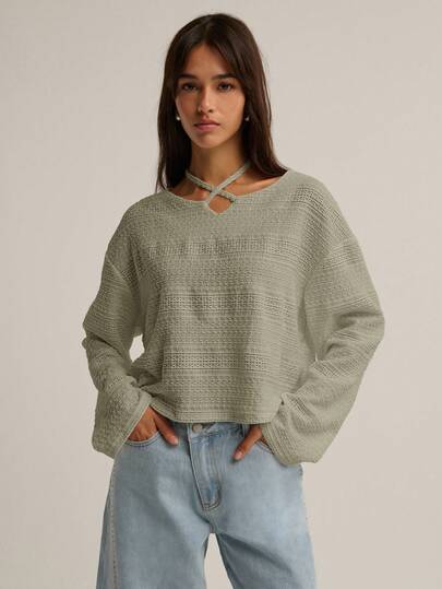 Nöista 长袖针织衫，方形廓形，独特的挂脖式肩带设计，打造轻松别致的造型，是女士冬季穿搭的完美之选；易于日常穿着，适合休闲季节造型、节日圣诞节装扮和现代新年装束。