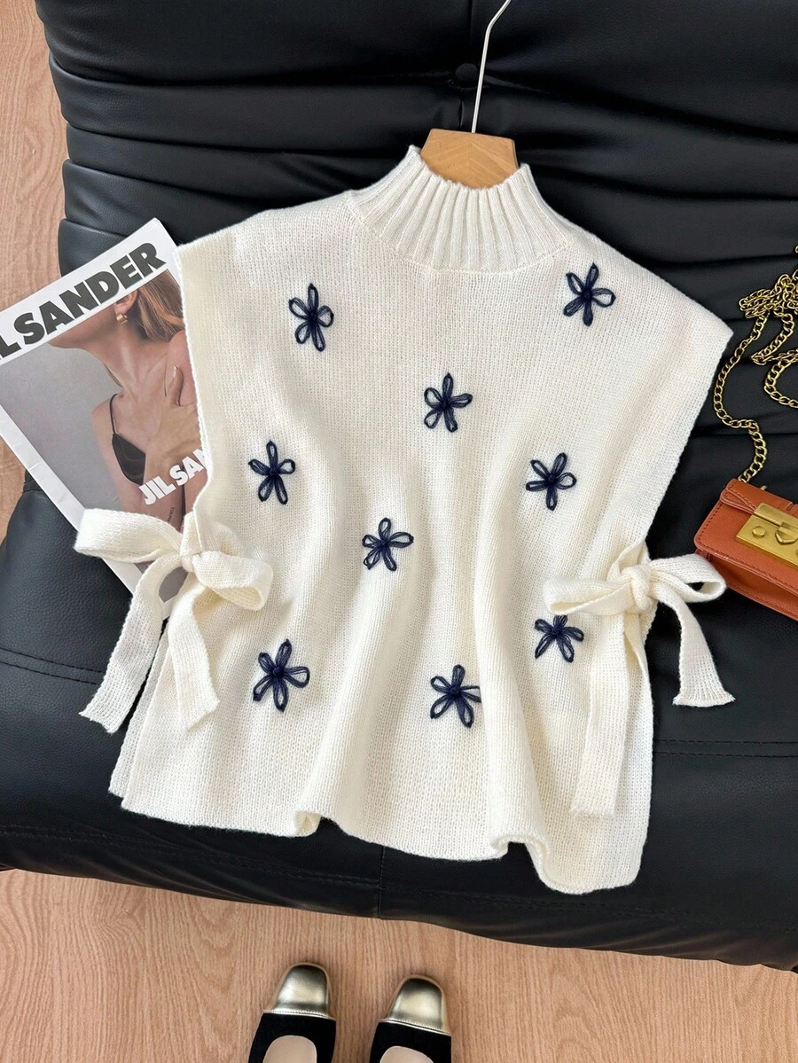 SHEIN Frenchy 简约舒适3D立体花卉装饰侧系带高领毛衣背心,女士针织上衣,毛衣上衣,女士毛衣,女士套头衫,女士套头衫,撞色钩针花卉毛衣,高领无袖毛衣,花卉刺绣保暖毛衣,磨毛质感毛衣,适合秋季、冬季、四季穿着,适合办公室休闲穿着,法式风格,商务休闲风格,优雅,通勤,简约,办公室,复古,简约,日常穿着 - 杏色 - 查看 1