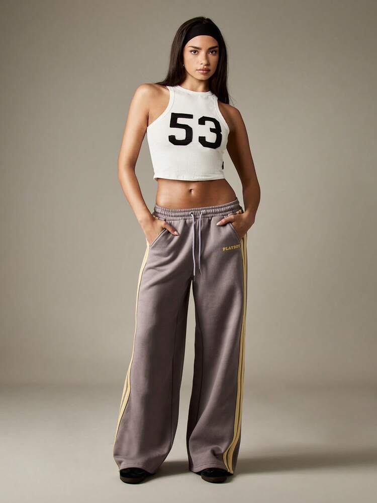 Missguided x Playboy サイドストライプ入り ドローストリング ワイドレッグ スウェットパンツ カジュアルで快適