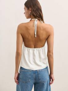 Nöista This Sleeveless Halter Top In Muted Olive Features A Draped Front And Wooden Bead Neckline, Creating A Relaxed, Flowy Silhouette. Perfect For Summer Outfits, Cute Summer Tops, Plus Size Summer Clothes, And Women's Summer Clothes.