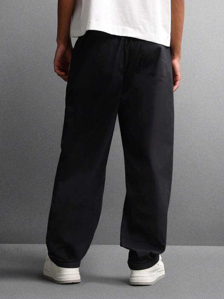 Spodnie dresowe z szerokimi nogawkami i wzorem krzyżowym