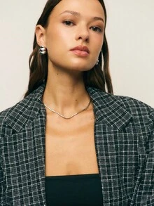 Nöista Nöista's Black Tweed Suit Set Pairs An Oversized Longline Blazer With A Matching Mini Skirt-Ideal For Fall Office Outfits, Polished Winter Looks, Or Stylish Women's School Fashion.