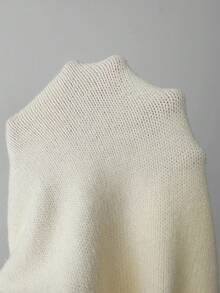 Elenzga Cardigan court à volants pour femmes, style pull blanc avec décoration unique de boutons en métal. Pull tricoté pour dames