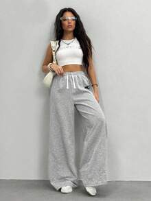 Sparklyn Spodnie dresowe dla nastolatek o luźnym kroju i zakrzywionych nogawkach, modne na co dzień, uniwersalne, sportowe, długie, odpowiednie do tańca, szkoły i sportu