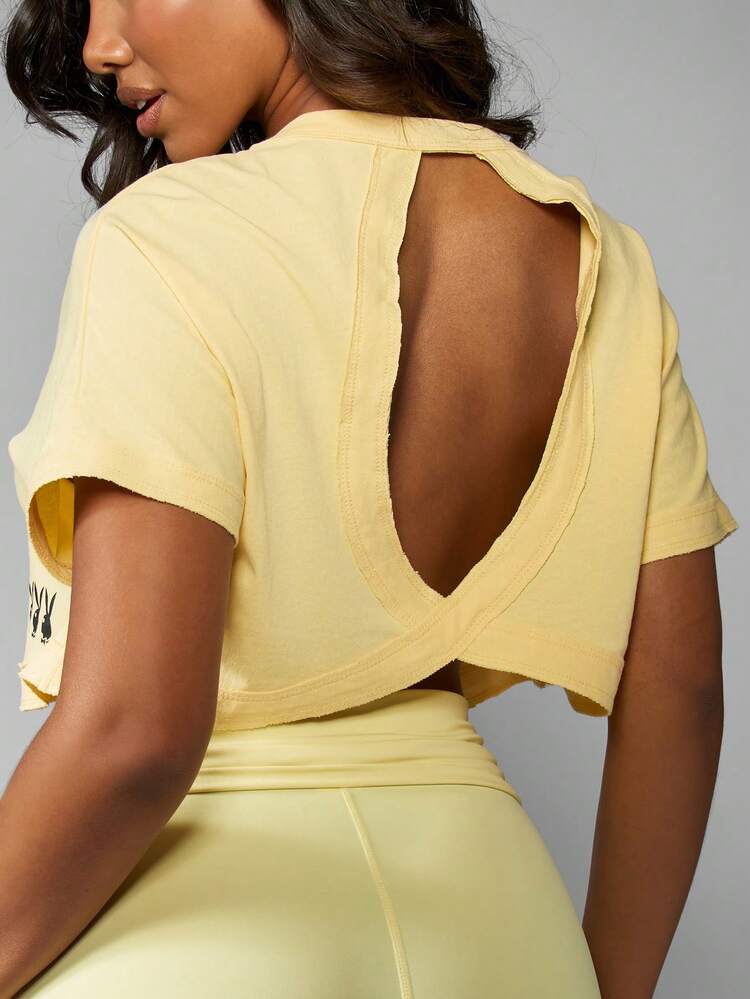 Missguided x Playboy Aktiver Crop Top mit Kreuzrückendetail, Kurzarm Baumwoll-T-Shirt